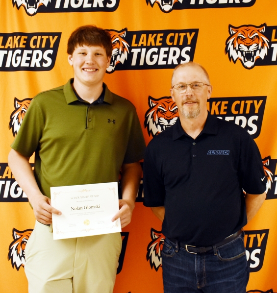 The Acrotech tech college scholarship, $750, went to Nolan Glomski (left). He’s pictured with presenter Andy Oliver.