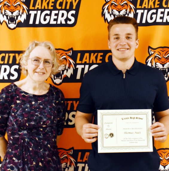 Bonnie and Doyle Wait Memorial Scholarship, $1,000. Pictured are recipient Thomas Nutt (right) and presenter Dr. Candance Wait.