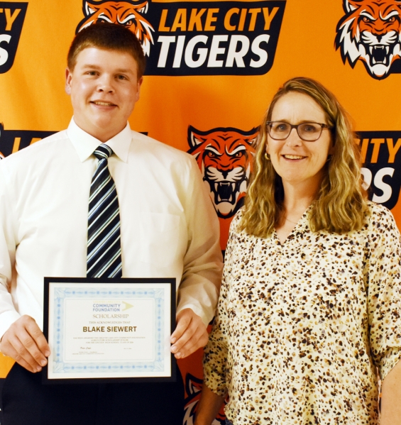 Greater Lake City Community Foundation Agriculture Scholarship, $1,500. From left are recipient Blake Siewert and presenter Jolene Harvey.