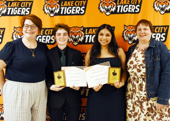 The Fred Waring Director’s Award for Chorus, $250 each. From left are presenter Amy Rogness, recipients Joshua Weyer and Emily Silva-Almanza, and presenter Becky Laqua.