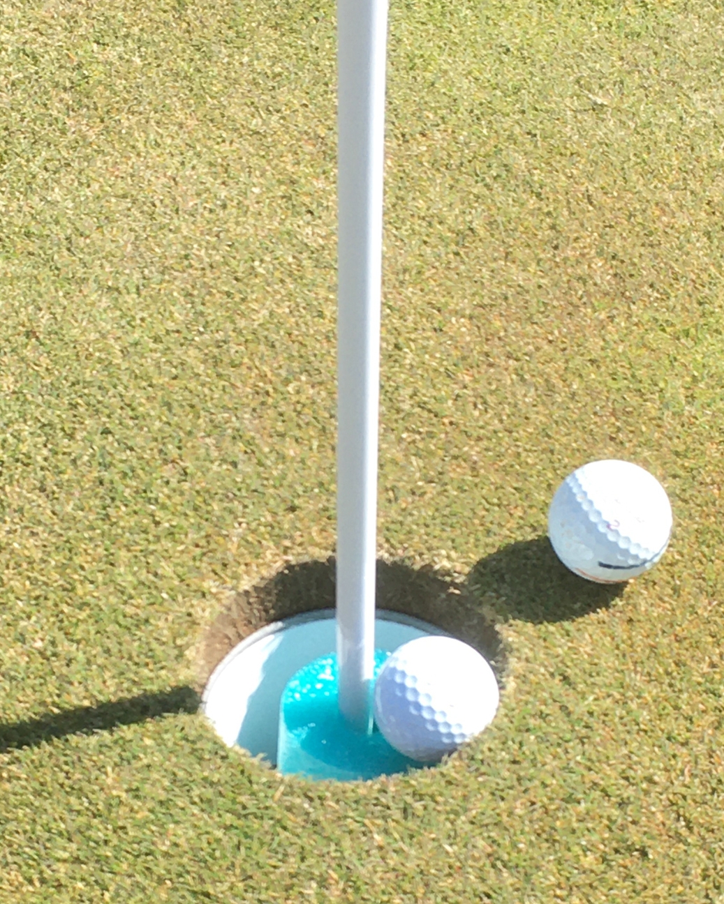 A pool noodle in a cup at The Jewel Golf Club allows golfers to retrieve their ball without touching – and potentially contaminating – the cup and flag stick. Golf courses are changing rules and course amenities to eliminate surfaces that could spread coronavirus.