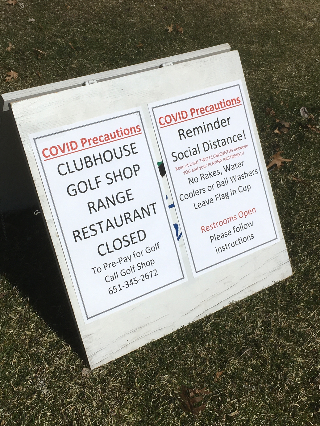 A sign at The Jewel Golf Club listing COVID-19 precautions.